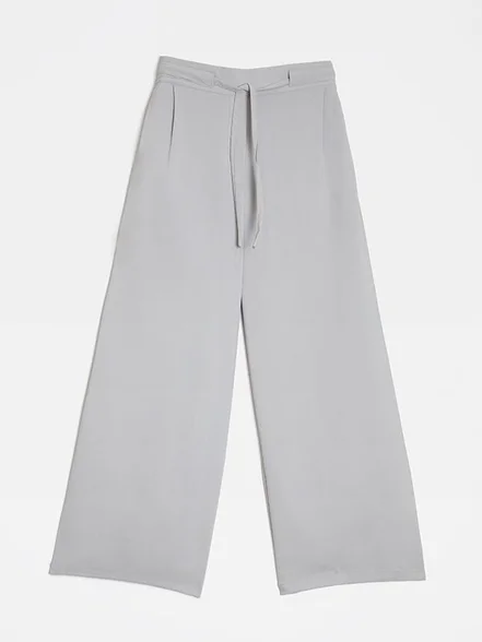 شلوار زنانه پارچه ای کرپ کره ای از بالا گشاد پیلی دار پشت کمرکش کژوال آرانا بُرنُس